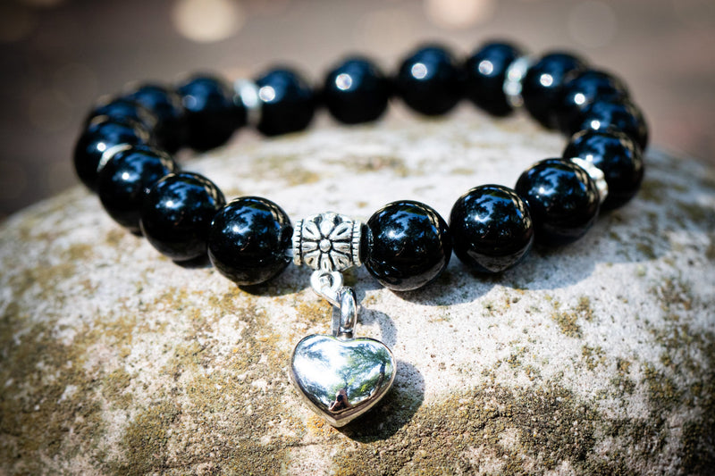 onyx keepsake urn bracelet on rock